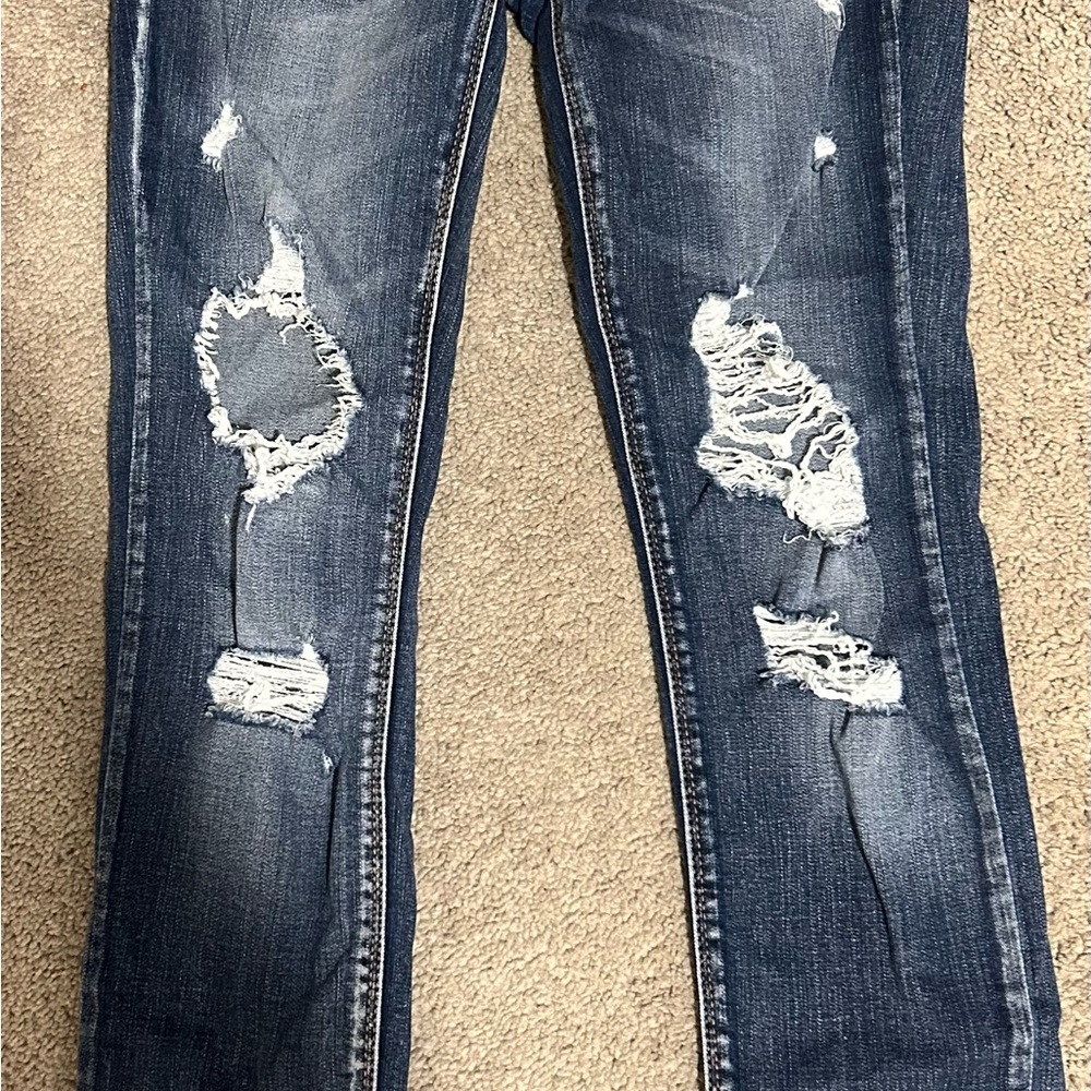 Distressed Blue Jeans